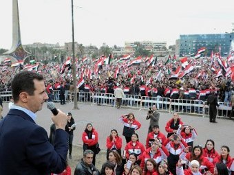 Башар Асад выступает на митинге своих сторонников. Фото (c)AFP Башар Асад выступает на митинге своих сторонников. Фото (c)AFP