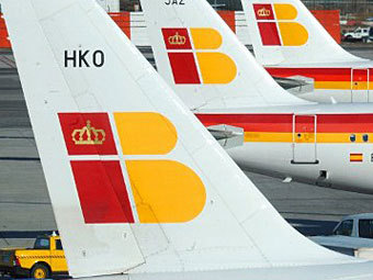 Самолеты авиакомпании Iberia. Фото (c)AFP Самолеты авиакомпании Iberia. Фото (c)AFP
