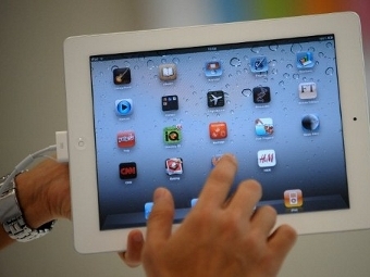 Планшет iPad, фото ©AFP