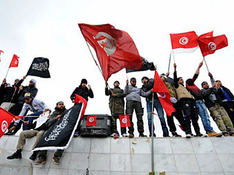 Митинг сторонников партии 'Нахда'. Фото (c)AFP Митинг сторонников партии 'Нахда'. Фото (c)AFP