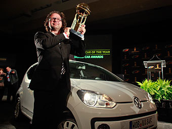 Дизайнер Volkswagen Оливер Штефани на вручении премии. Фото Reuters