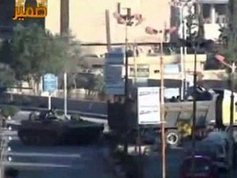 Танк в Дамаске. Скриншот видео, распространенный (c)AFP Танк в Дамаске. Скриншот видео, распространенный (c)AFP