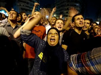 Участники митинга, посвященного результатам первого тура выборов в Египте. Фото (c)AP Участники митинга, посвященного результатам первого тура выборов в Египте. Фото (c)AP