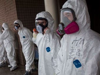Участники операции по ликвидации последствий аварии на АЭС "Фукусима-1". Архвиное фото ©AP