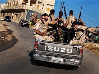 Сирийские военные. Архивное фото (c)AP Сирийские военные. Архивное фото (c)AP