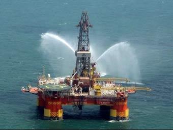 Иранская нефтяная платформа в Каспийском море. Архивное фото (c)AFP Иранская нефтяная платформа в Каспийском море. Архивное фото (c)AFP