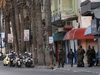 Сирийская полиция на улицах Латакии. Архивное фото (c)AFP Сирийская полиция на улицах Латакии. Архивное фото (c)AFP
