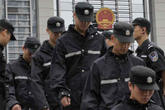 Китайские полицейские. Фото Reuters