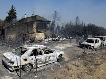 Последствия лесного пожара во Франции. Фото (c)AFP Последствия лесного пожара во Франции. Фото (c)AFP
