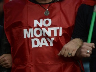 Участница акции протеста в Риме. Фото (c)AFP Участница акции протеста в Риме. Фото (c)AFP