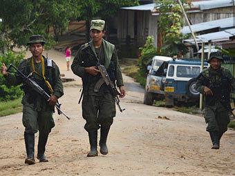 Бойцы FARC. Фото (c)AFP Бойцы FARC. Фото (c)AFP