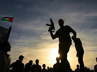 Боевики ФАТХа. Архивное фото (c)AFP Боевики ФАТХа. Архивное фото (c)AFP