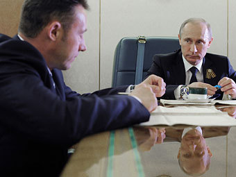 Владимир Путин и Игорь Холманских. Фото ИТАР-ТАСС, Алексей Дружинин